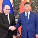 Xi Meets Russian PM in Beijing